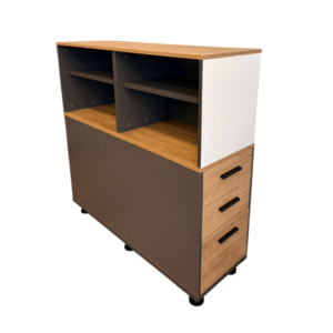 Librero lateral UR-958 con cajonera integrada, fabricado en melamina de 16 mm con acabado laminado plástico. Incluye sistema de archivo colgante, cerradura y correderas de extensión completa.